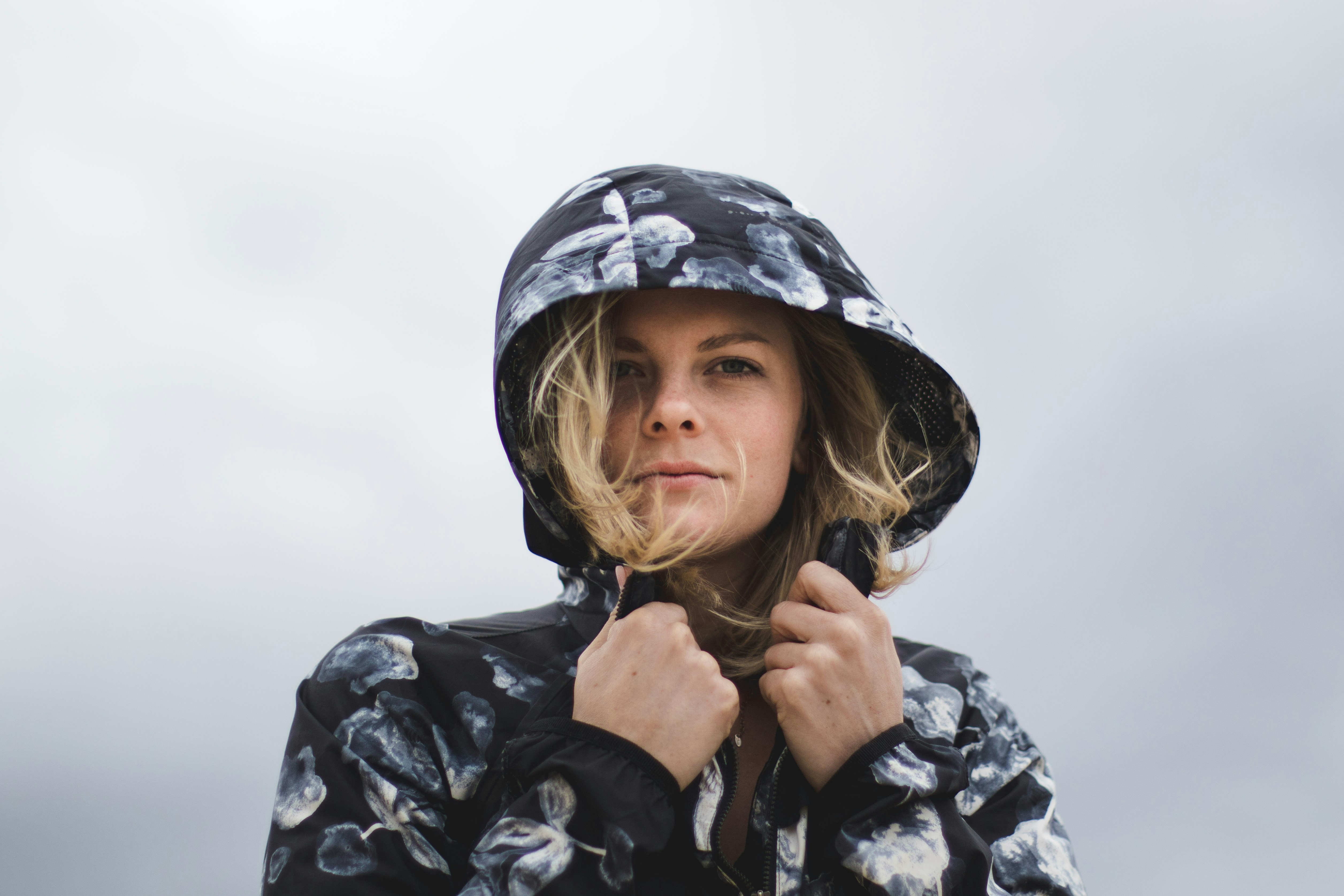 close-up photography of woman wearing hoodie